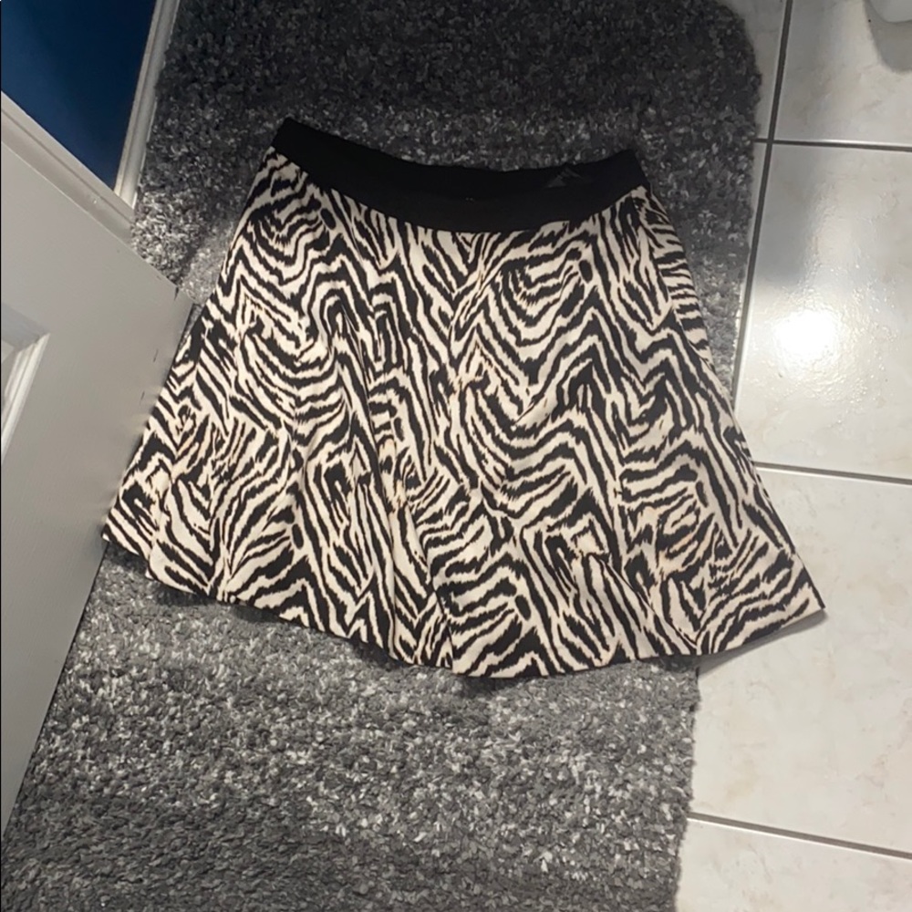 Pink/black and white cheetah print skirt.